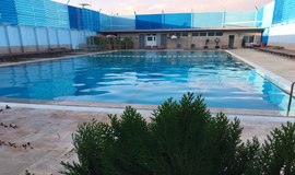 تصاویر استخر روباز و سرپوشیده دهکده آفتاب مهرشهر